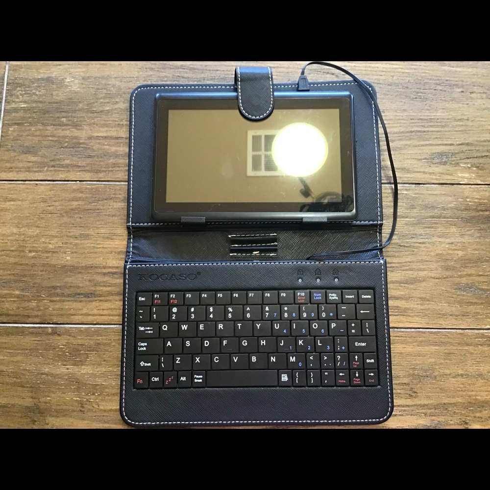 iRola tablet with case and keyboard.